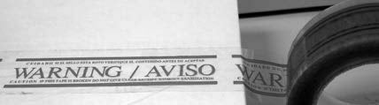 PP20W  WARNING/AVISO  2"  Warning Tape on Clear or White Film
